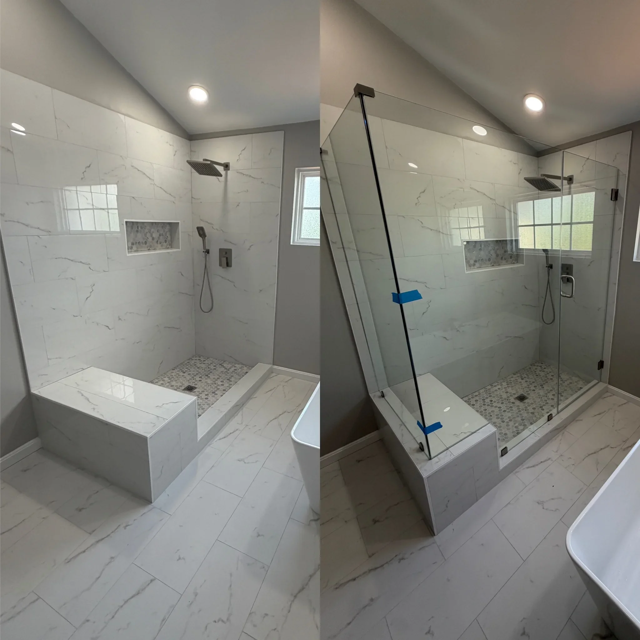 Frameless glass shower enclosure with marble tile surround and brushed nickel fixtures