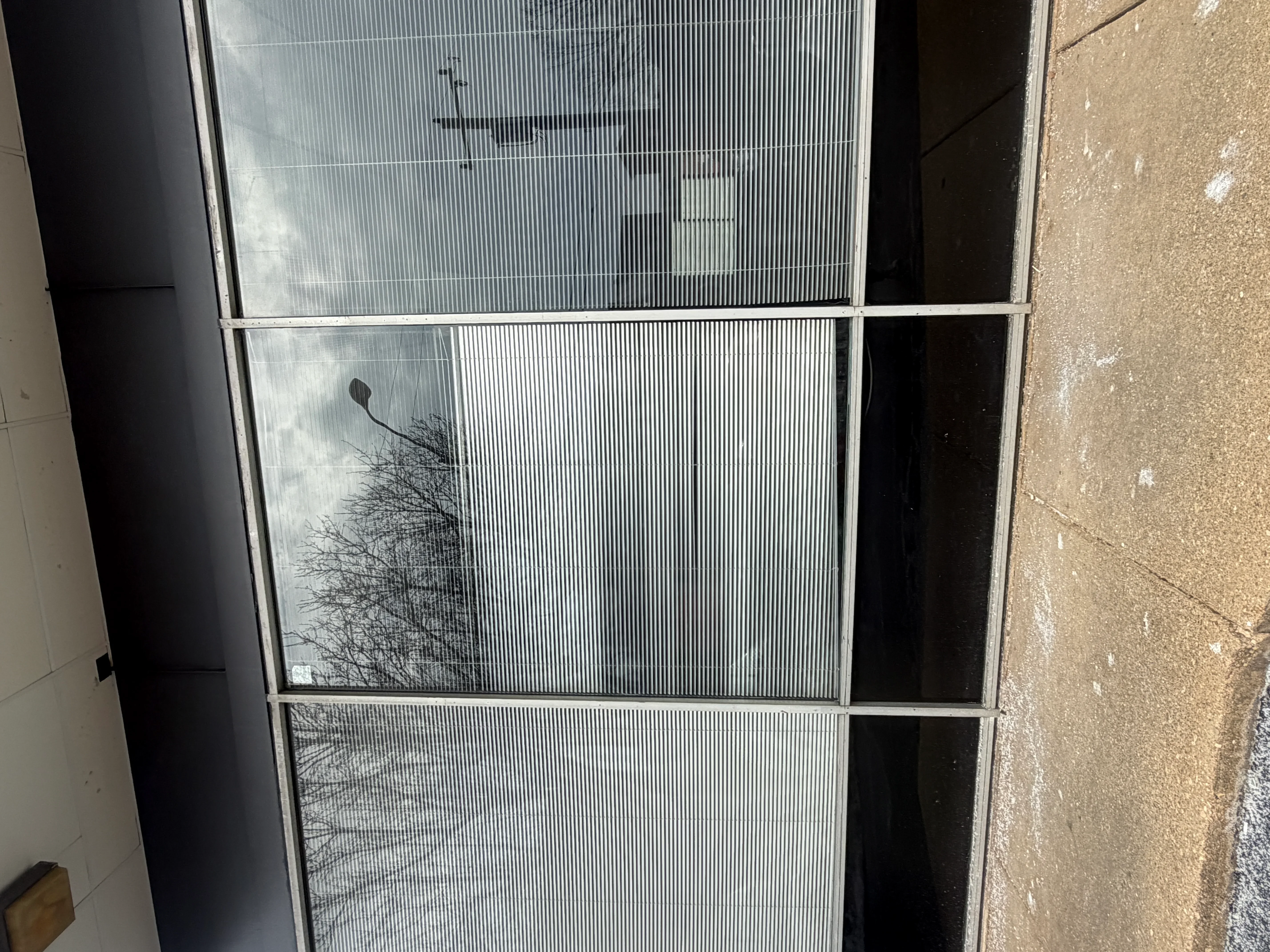 New window screen mesh installed in aluminum frame with clear visibility