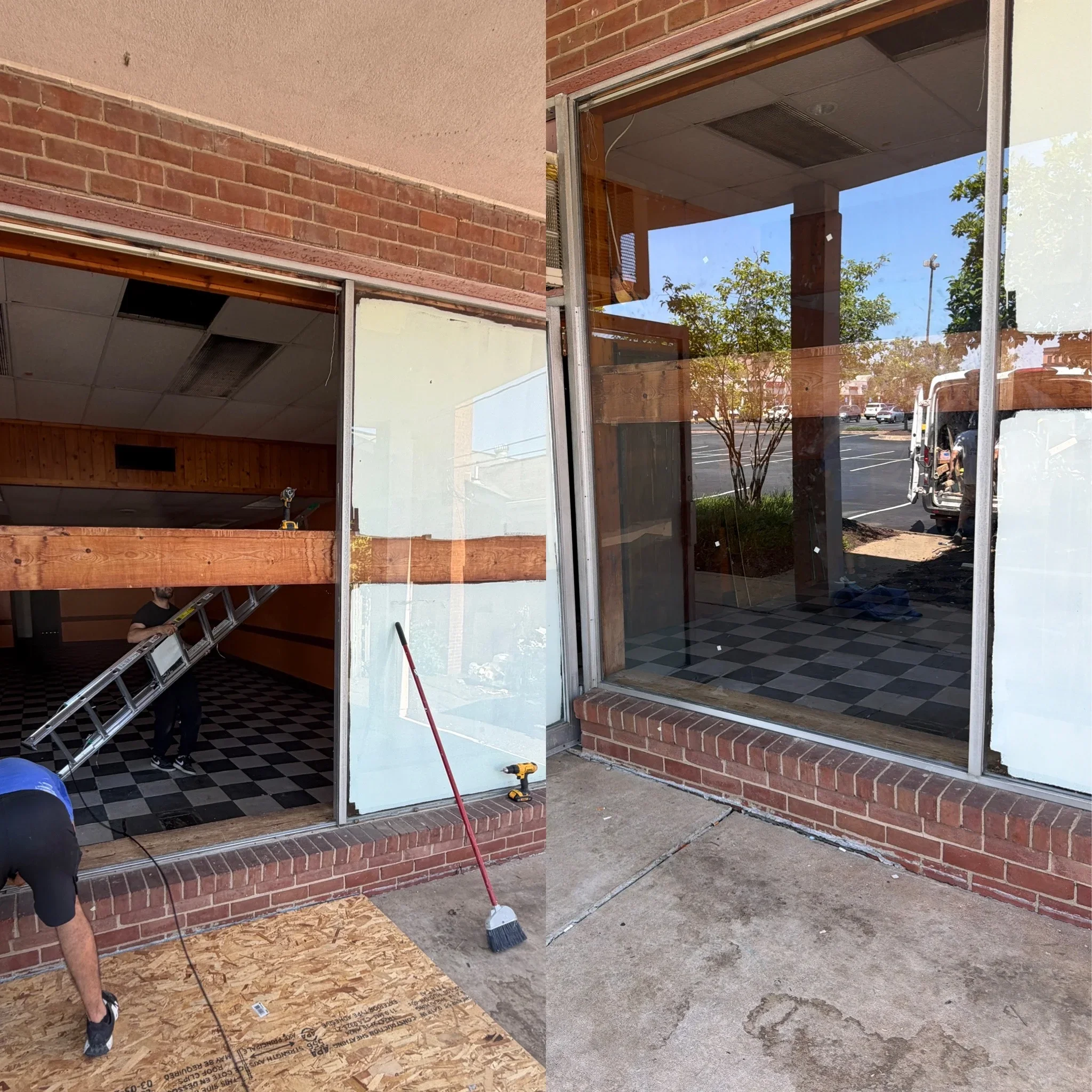 Commercial storefront with new glass panels and aluminum framing installed on brick building